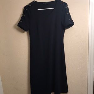 Navy dress with gold shoulder detail